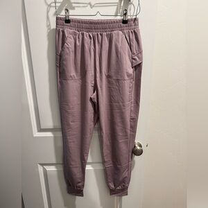 Gold Elite satin jogger pants in a misty mauve- women’s medium